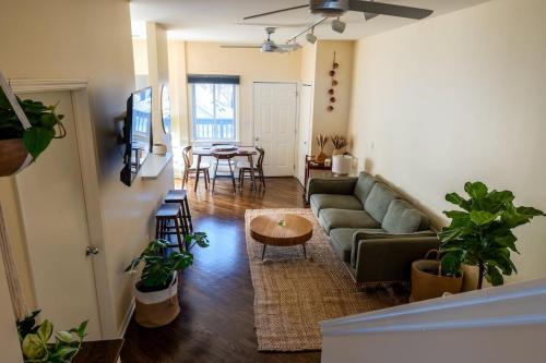 a living room with a couch and a table at Bucktown Private Condo in Chicago