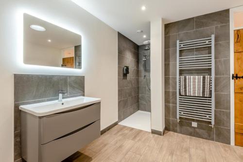 a bathroom with a sink and a shower at 4 Bed in Otterden oc-d36009 in Otterden