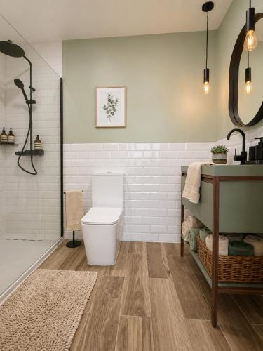 a bathroom with a toilet and a sink at Iconic Vila d'Obidos in Óbidos