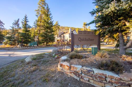 a sign in front of a building with a street at Quicksilver #1602 in Keystone