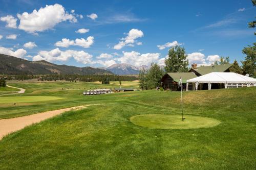 a view of a golf course with a putting green at Flying Dutchman #1158 in Keystone
