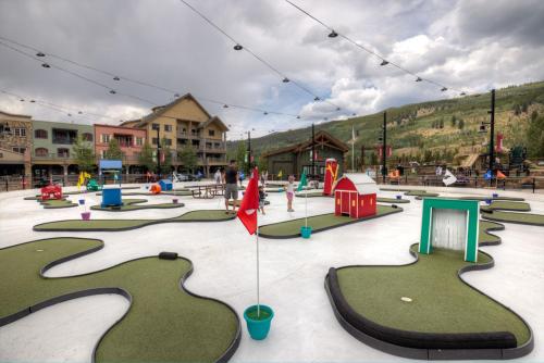 a playground with a bunch of miniature play areas at Flying Dutchman #1158 in Keystone