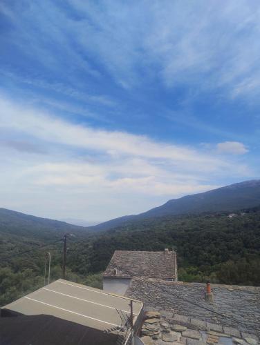 a view of a tennis court on top of a building at Chez Eli in Luri