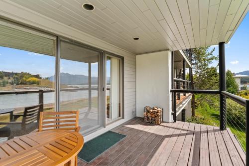 a porch with a view of the water at East Bay Condos #111 in Dillon