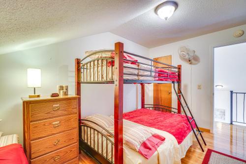 a bedroom with a bunk bed and a dresser at House & Tiny Cabin! Multi-Acre East TN Property in Englewood
