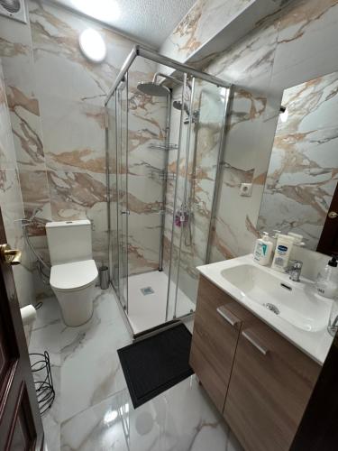 a bathroom with a shower and a toilet and a sink at TAJ house center Altea #C in Altea