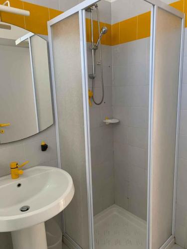 a bathroom with a shower and a sink at Apartment with Pool in Rosolina Mare 57971 in Rosolina Mare