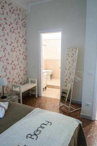 Postel nebo postele na pokoji v ubytování A Casa di Benny