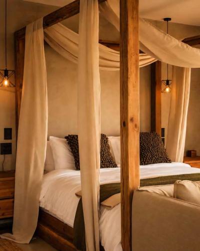 a couple of bunk beds in a room at Sanyati Villa in Mmukubyane