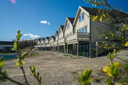 a large building with a lot of windows at Steam Pier Adventure Hotel in Tromsø