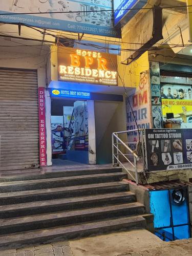 an entrance to a building with stairs in front at HOTEL BPR Residency in Hyderabad