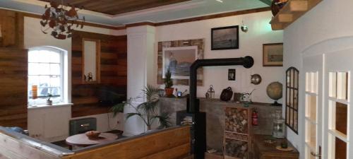 a kitchen with a stove in a room at Pferdestall in Kiel
