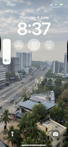 a view of a city with buildings and a highway at JDs elite in Trivandrum
