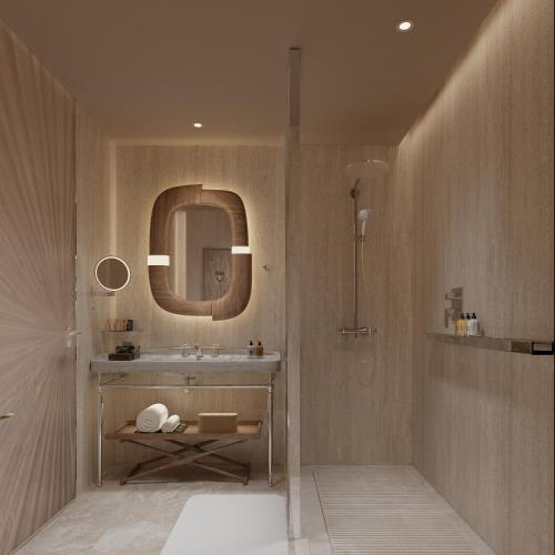 a bathroom with a sink and a mirror at Steigenberger Inselhotel in Konstanz