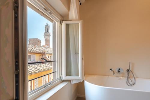 Gambar di galeri bagi AmiRooms Affittacamere di Siena