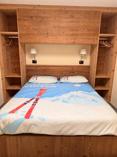 a bed in a room with wooden bunk beds at Miramonti Bellevue in Sauze dʼOulx
