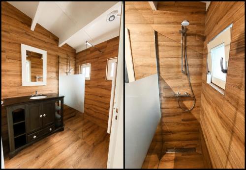 a bathroom with a shower and a sink at Villa Mar veluwe in Ermelo