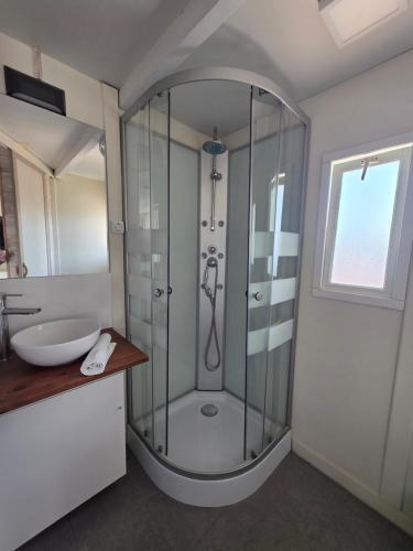 a bathroom with a shower and a sink at Camping San Javier in San Javier