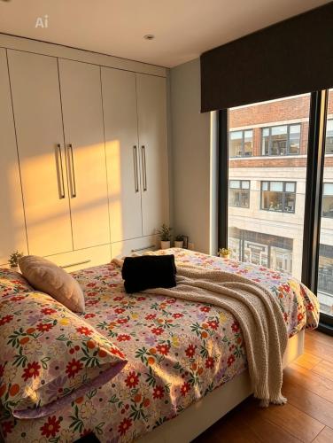 Säng eller sängar i ett rum på Splendid Euston flat