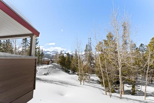 a winter view from the backyard of a house at Rockridge #41 in Breckenridge