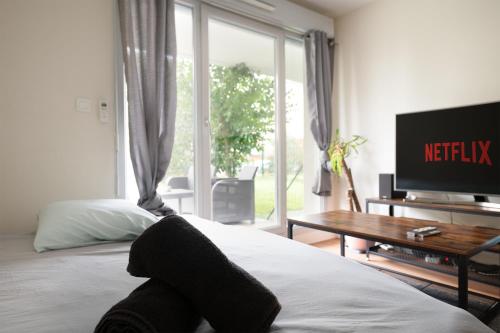 L'Ovalie Appartement T2 CLIMATISÉ et JARDIN