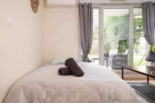 L'Ovalie Appartement T2 CLIMATISÉ et JARDIN