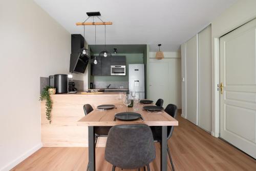 L'Ovalie Appartement T2 CLIMATISÉ et JARDIN