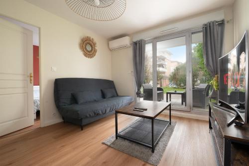 L'Ovalie Appartement T2 CLIMATISÉ et JARDIN