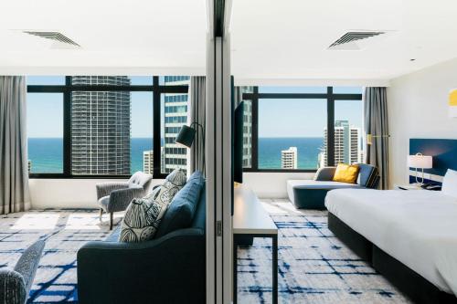 a hotel room with a view of the ocean at voco Gold Coast by IHG in Gold Coast