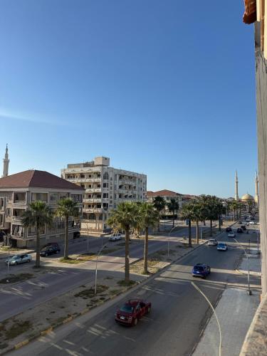 an aerial view of a city street with cars and buildings at Ras elbar Palace in Ras El Bar