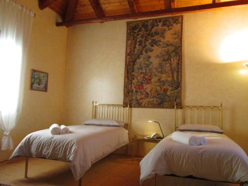 Katil atau katil-katil dalam bilik di La Centuria Società Agricola Casa Vacanze