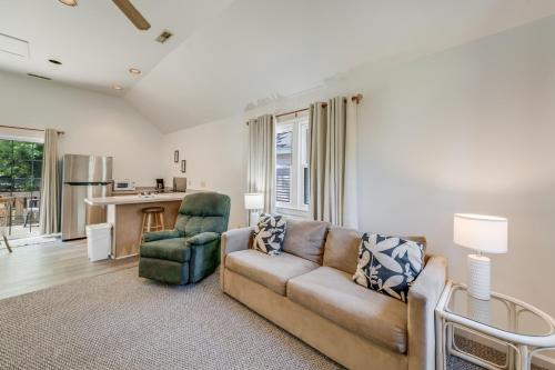 a living room with a couch and a chair at Chris Cottage 1 in Chincoteague