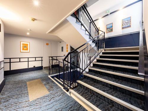 a view of a staircase in a building at ibis Styles Marseille Centre Prado Place Castellane in Marseille