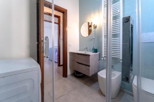 a bathroom with a sink and a toilet and a shower at Altea in Fossacesia