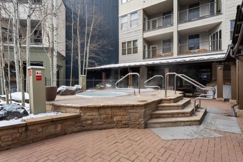 a hot tub in the middle of a building at Silver Mill #8274 in Keystone