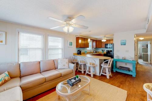 a living room with a couch and a table at North Point Condo 301 in Ocean City