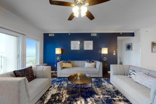 a living room with two couches and a ceiling fan at Cori Noel 102 in Ocean City