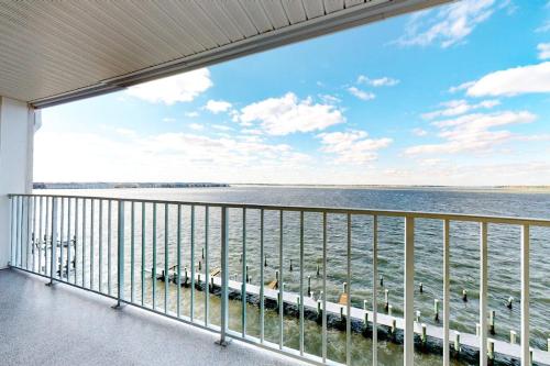 a balcony with a view of the water at Thunder Island 28A in Ocean City