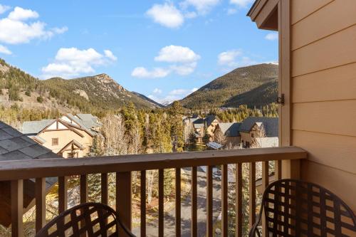 a view from the balcony of a house with mountains at Red Hawk Lodge #2308 in Keystone