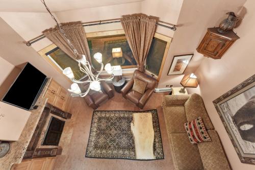 an overhead view of a living room with a chandelier at Telemark Lodge #504 in Copper Mountain