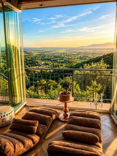 a living room with a view of the city at Aura Toscana Boutique in Monsummano Terme