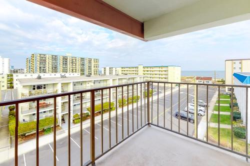 a balcony with a view of a parking lot at Sunny Sands 401 in Ocean City