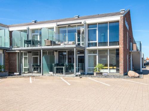 a building with a lot of windows on it at 5 star holiday home in Ringkøbing in Ringkøbing