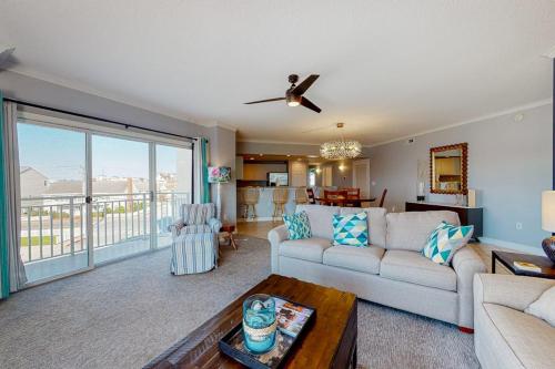 a living room with a couch and a table at Bahia Vista II 305 in Ocean City