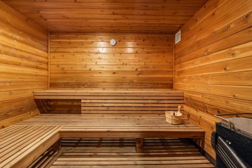 a wooden sauna with a bench in a room at North View Lodge High Country in Banner Elk