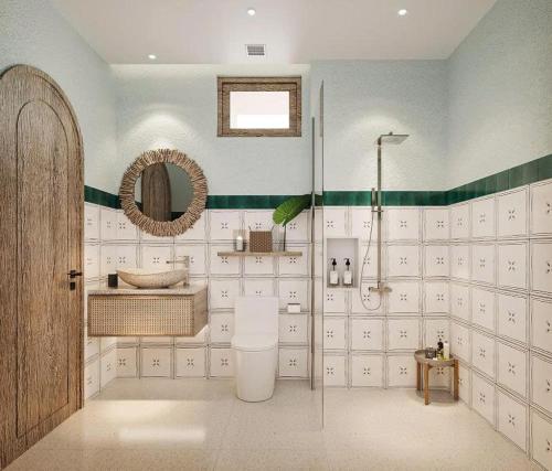 a bathroom with a shower and a toilet and a sink at Soho Boutique in Quảng Ngãi