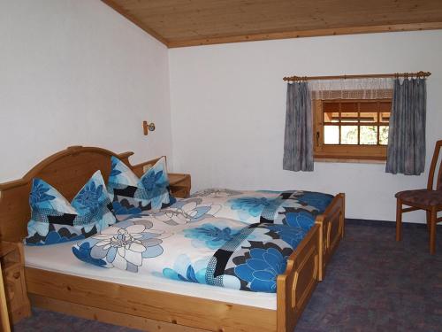 Posteľ alebo postele v izbe v ubytovaní Ferienwohnungen Luxner
