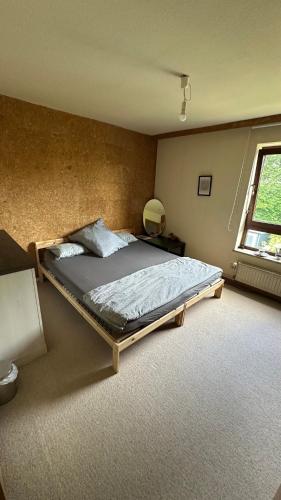 a bedroom with a large bed in a room at aba ZARA in Hamburg