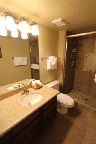 a bathroom with a sink and a toilet and a shower at Villas of Sedona, a VRI resort in Sedona