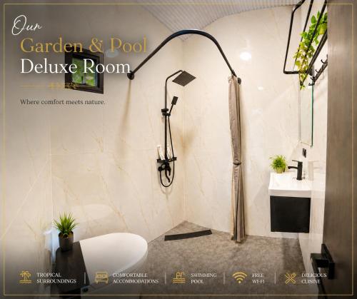 a bathroom with a shower and a sink at Annabel's Resort in Ferrol